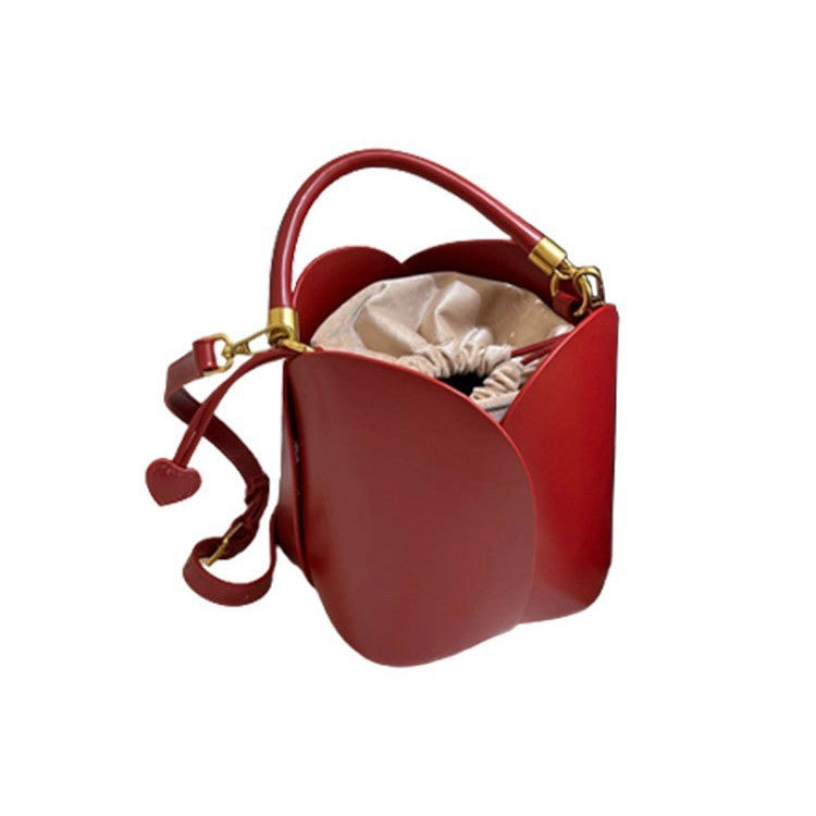 Brown soft PU leather mini bucket bag with floral silhouette