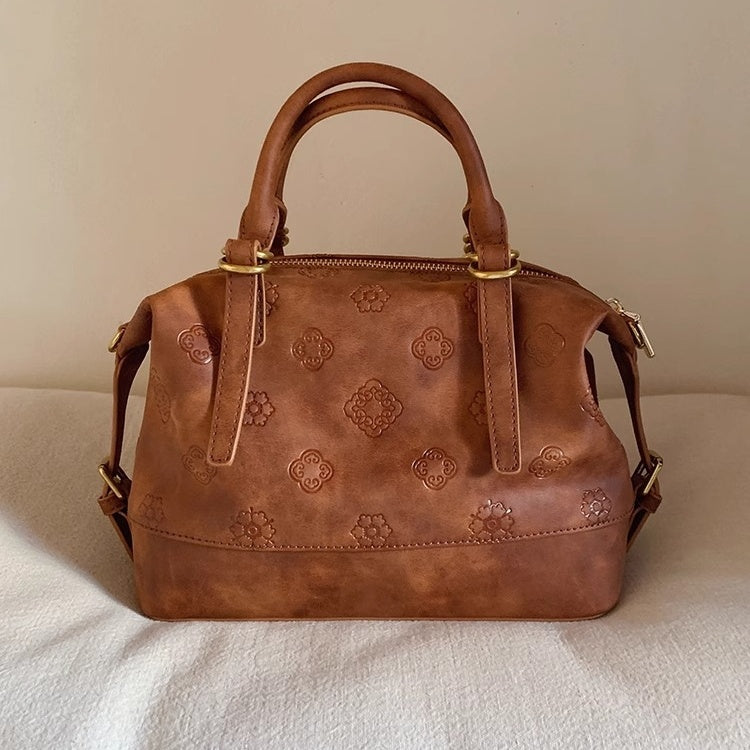 Styled view of rhombus messenger bag with casual outfit