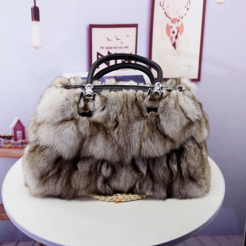 Elegant evening bag with silver fox fur texture