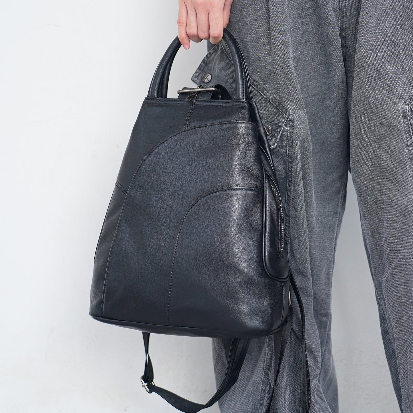 Front view of soft leather backpack with slit pocket