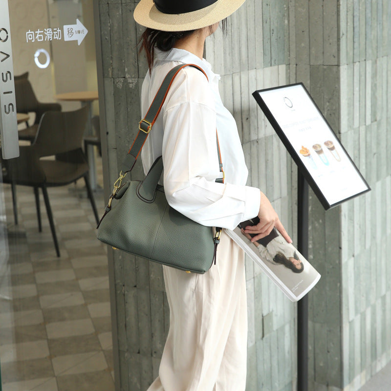 Golden brown cowhide crossbody bag with mobile phone pocket