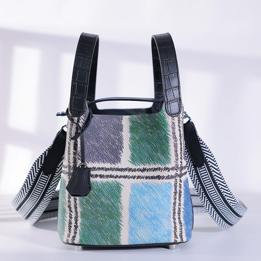 Inside view of cowhide bucket bag showing document pocket