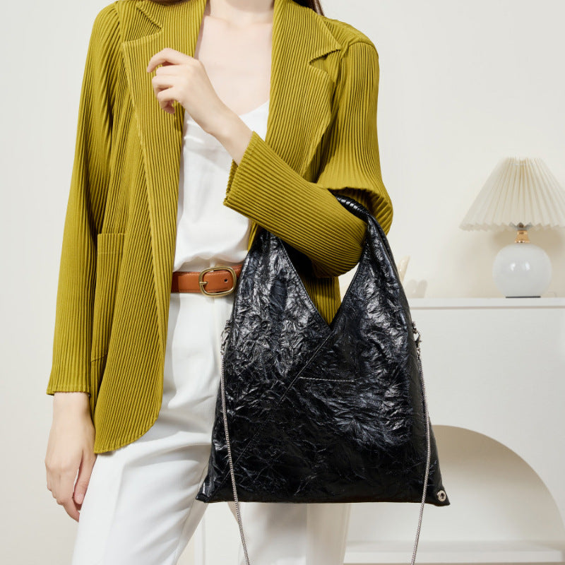 Cylinder-style large capacity leather tote with retro flair