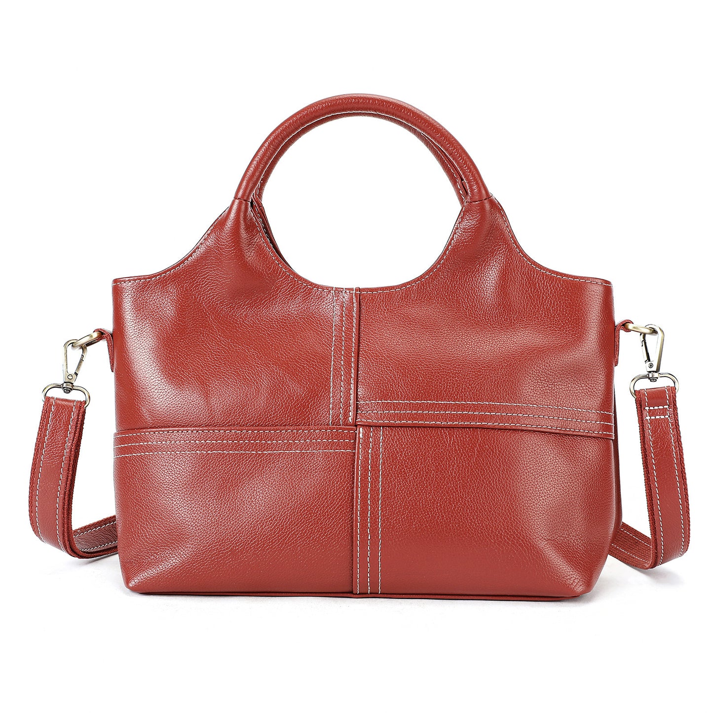 Woman holding black leather crossbody handbag