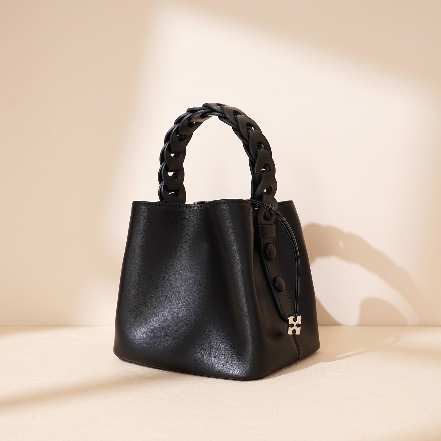Olive black cylindrical woven leather bucket purse