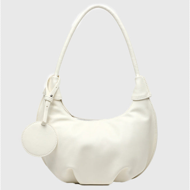Interior of dumpling bag showing phone and doc compartments