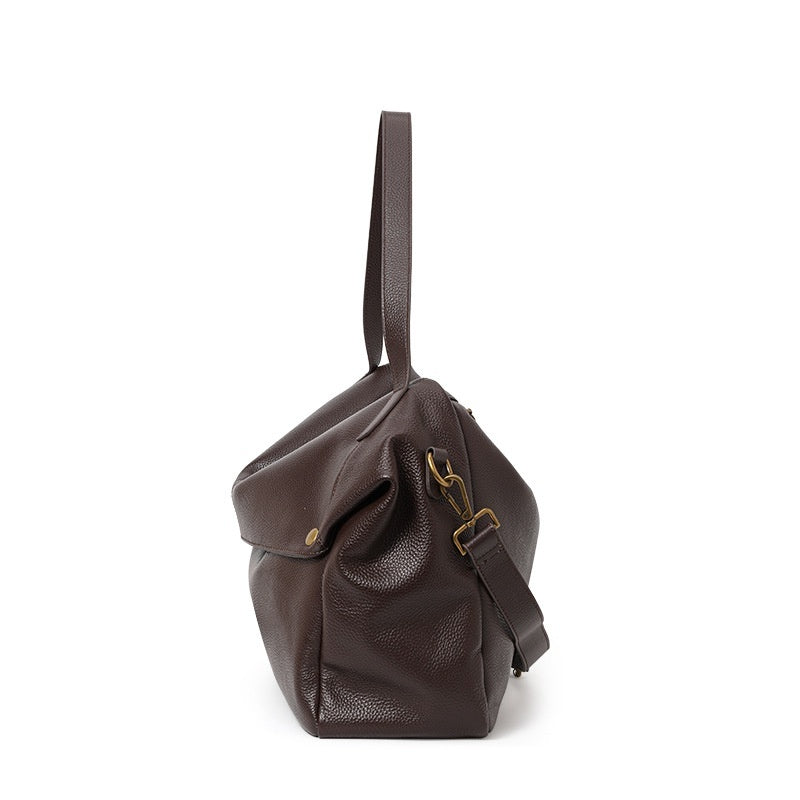 Interior view of leather commuter bag with zipper pocket