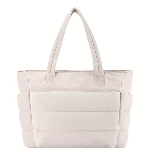 Interior layout with zip compartment and laptop sleeve