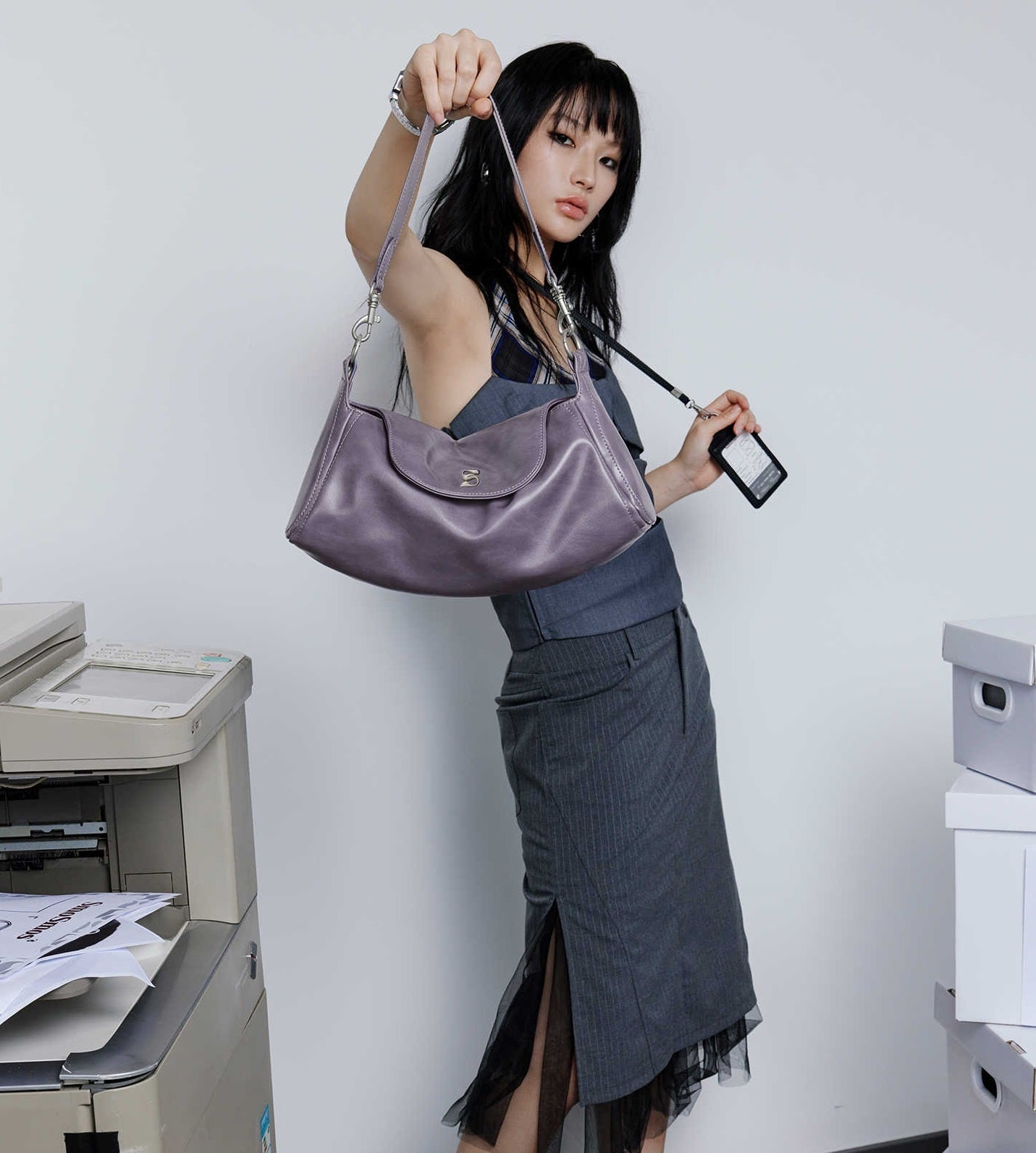 Side view of niche artificial leather underarm purse
