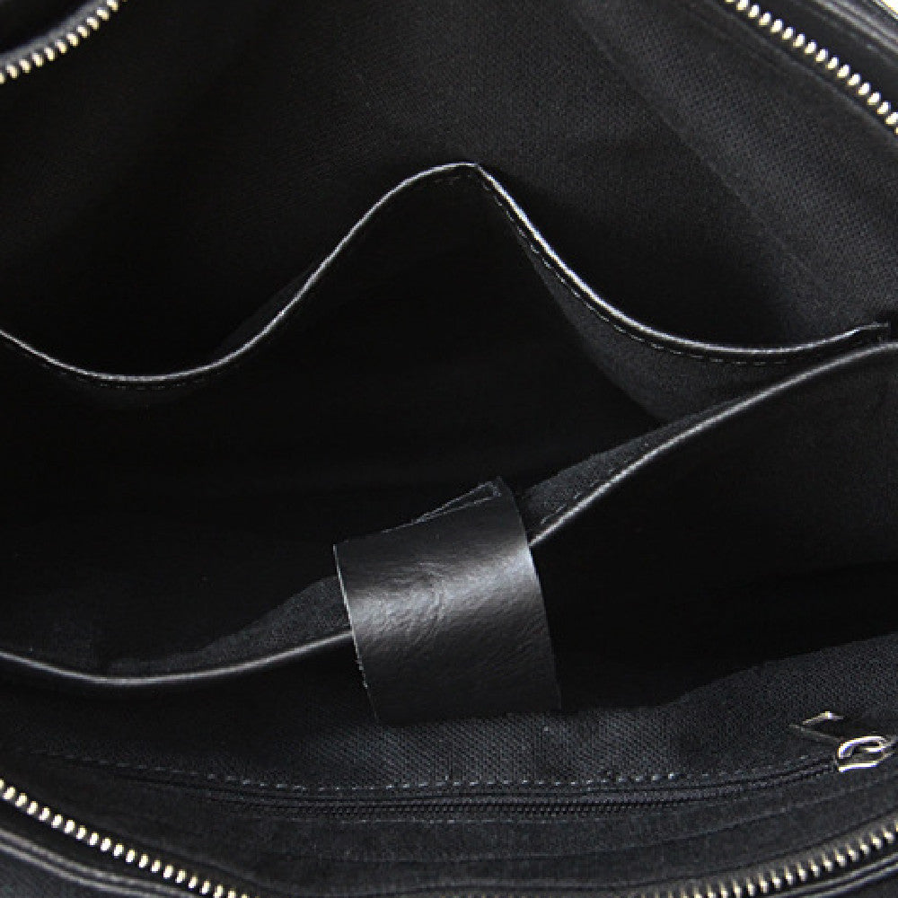 Top-down view of vintage cowhide crossbody purse