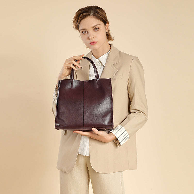 Interior of vintage satchel with zipper and phone pockets