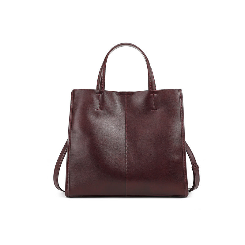 Side view of structured soft leather tote bag