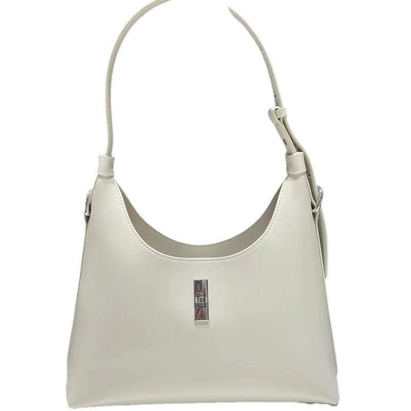 White genuine leather crossbody bag with lock and stitching