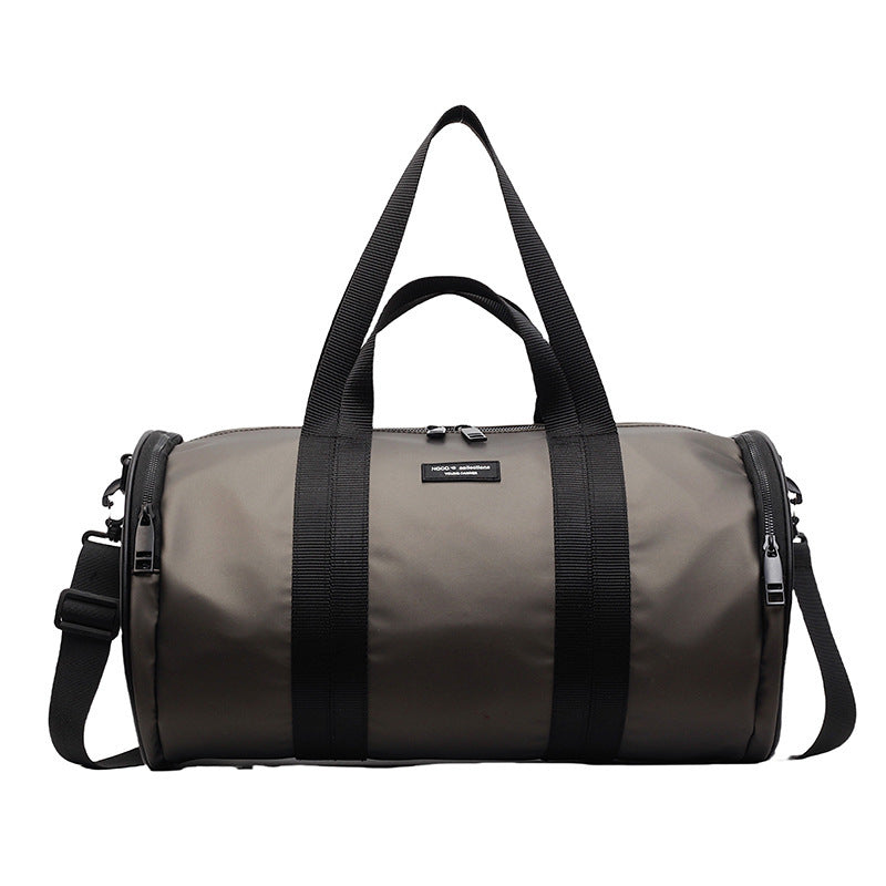 Man holding lightweight waterproof Oxford gym duffel