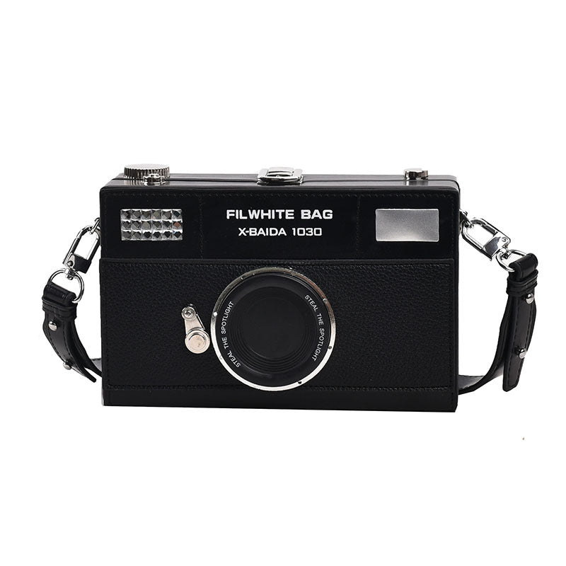 Interior view of mini crossbody camera bag with synthetic leather lining