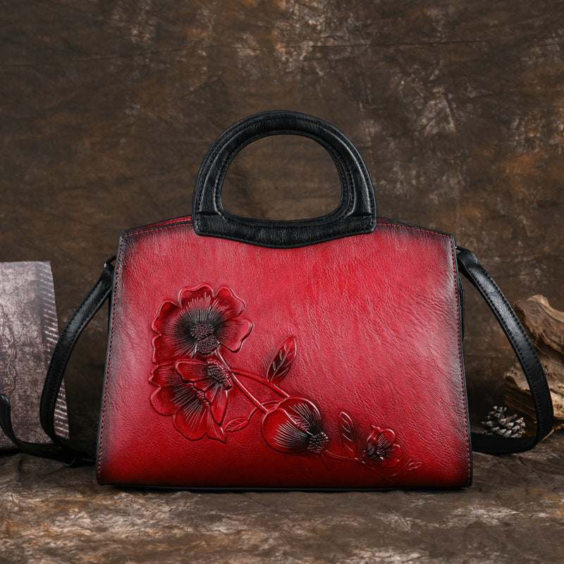 Retro red embossed handbag with contrast colors