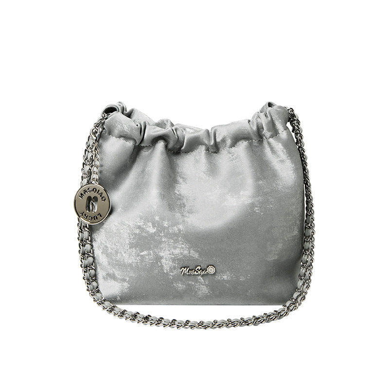Olive green crossbody purse styled for fall season