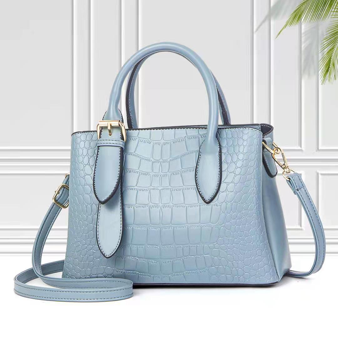 Black PU leather commuter tote with lock and crossbody strap