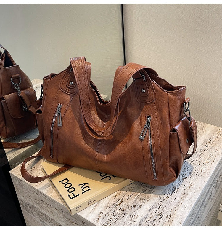 Interior view of PU handbag with zipper compartment