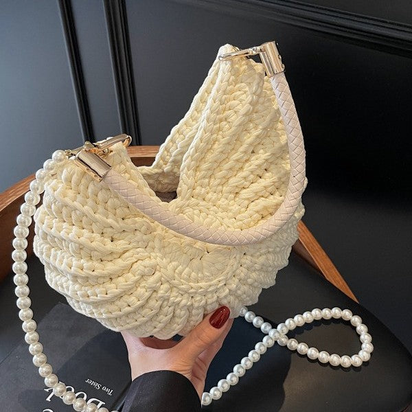 Handmade khaki woven tote bag with shell-shaped body and twin handles