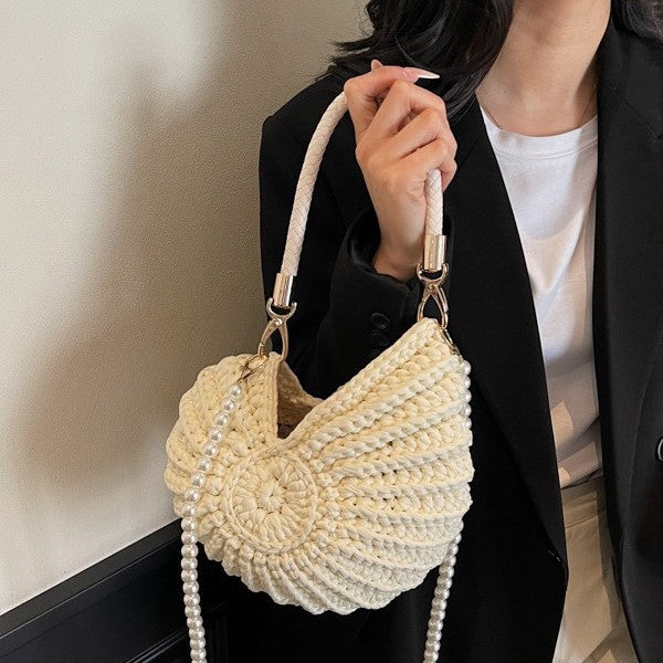 White shell-shaped womenβs woven tote bag with double shoulder straps