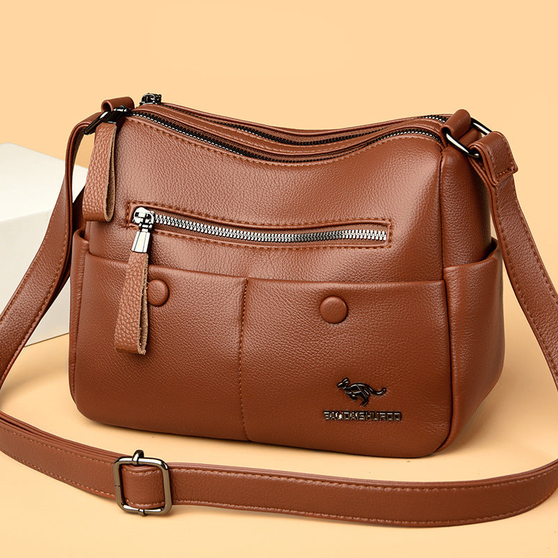 Side profile of women’s soft PU leather shoulder bag