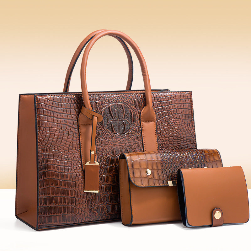 Side profile of PU leather crocodile textured women’s handbag