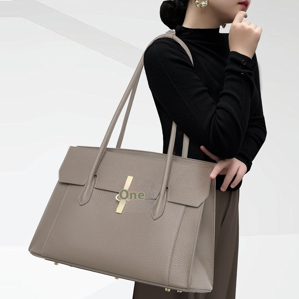 Side angle of black soft leather women's tote bag