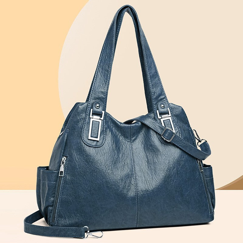 Close-up of stitching on PU leather European-style tote bag