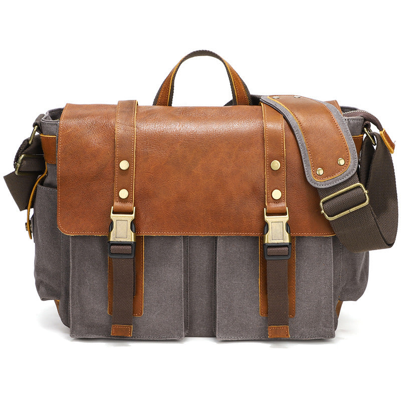 Man wearing gray waxed canvas crossbody bag in urban outfit