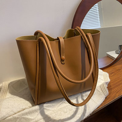 PU leather tote bag styled with workwear outfit