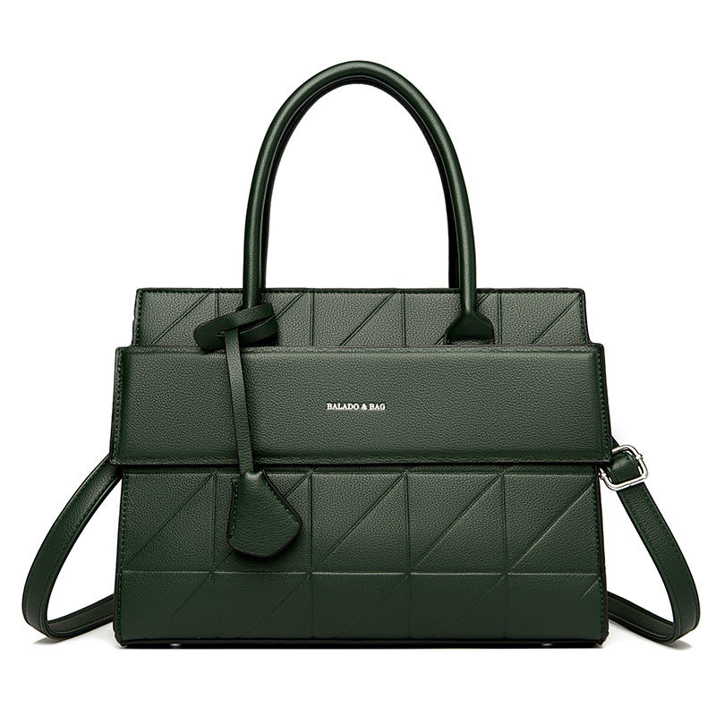 Side profile of women’s large tote handbag