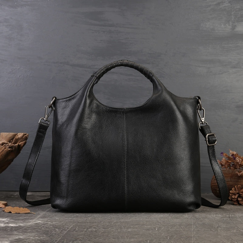 Front view of black vintage genuine leather tote bag