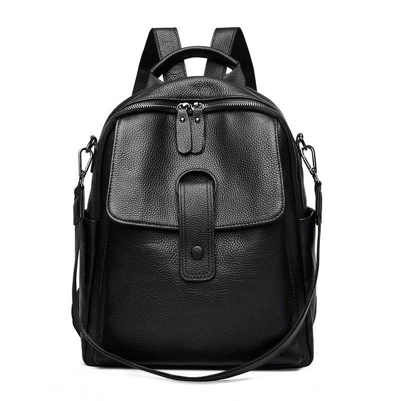 Stylish leather backpack worn by a woman outdoors