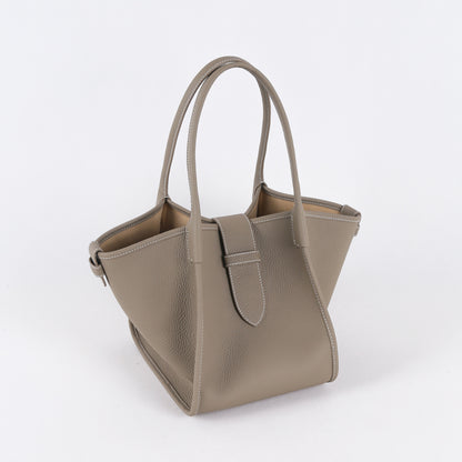 Beige handbag on a white background