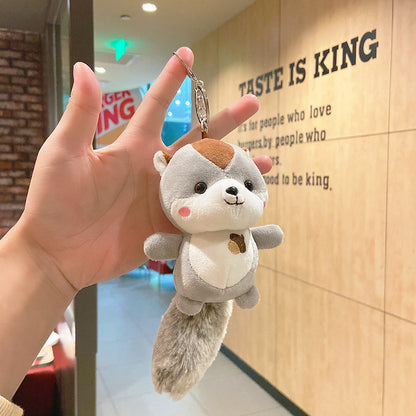 Decorative plush charm for backpacks
