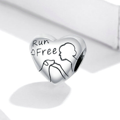 Handmade heart-shaped bead in oxidized silver