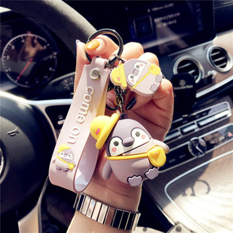 LuxeBlackBag cartoon penguin charm