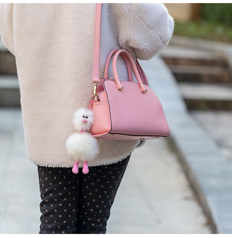 LuxeBlackBag quirky ostrich bag accessory