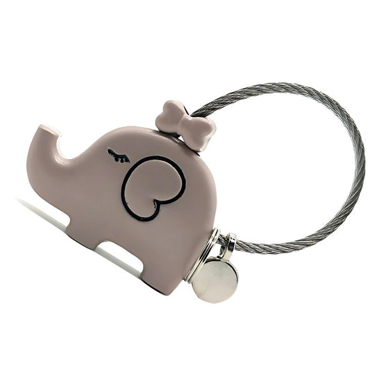 Keychain shaped like an elephant with a bow and a bell on a white background