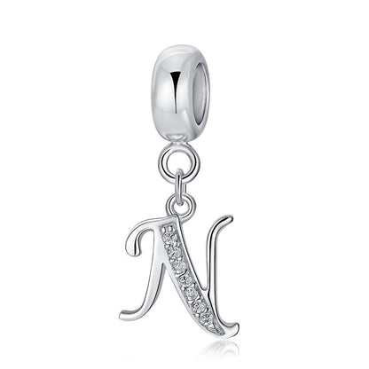 Silver charm with letter N