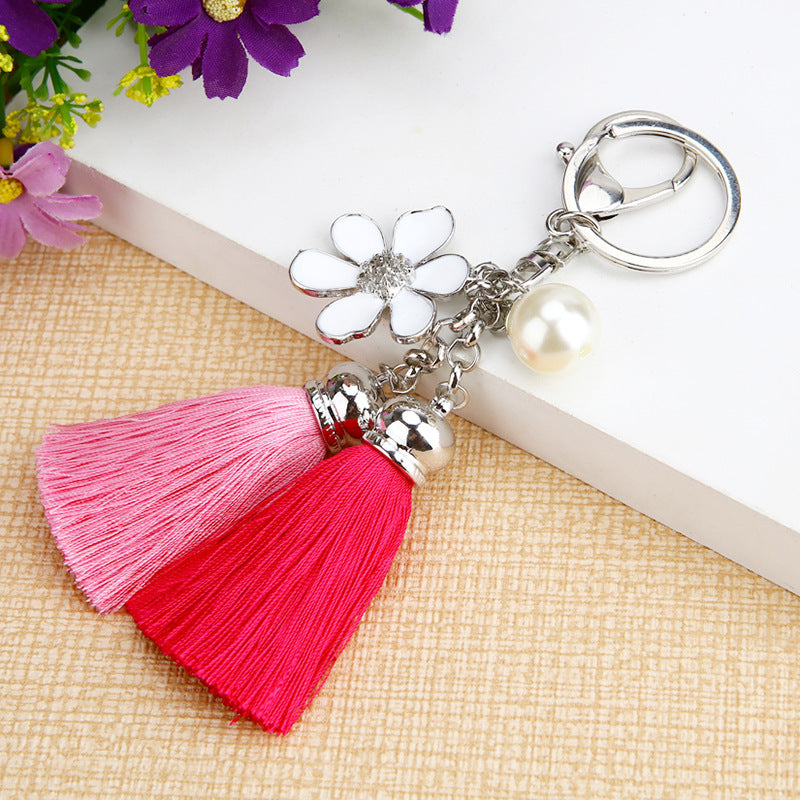 Stylish metal keychain with floral charm