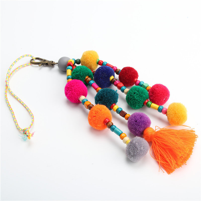Thin and elegant hair ball pendant