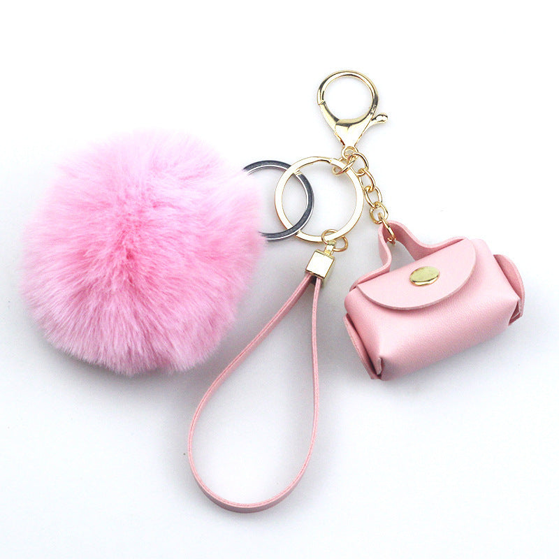 Women's leather keychain in purple and black