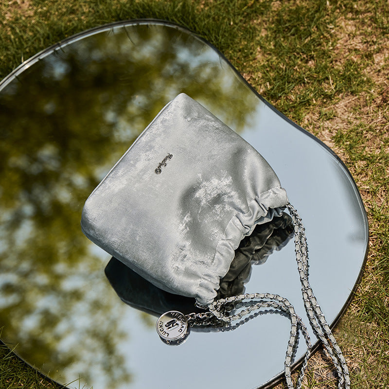 Side profile of autumn leather bucket bag