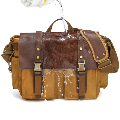 Black waxed canvas men’s crossbody bag styled for casual wear