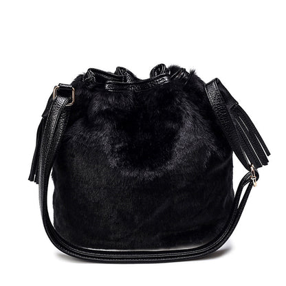 Interior view of the plush bucket bag showing ID bag, mobile pocket, and zipper pocket