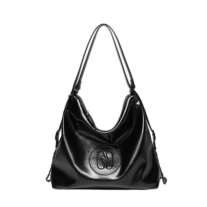 Side profile of synthetic leather commuter tote bag