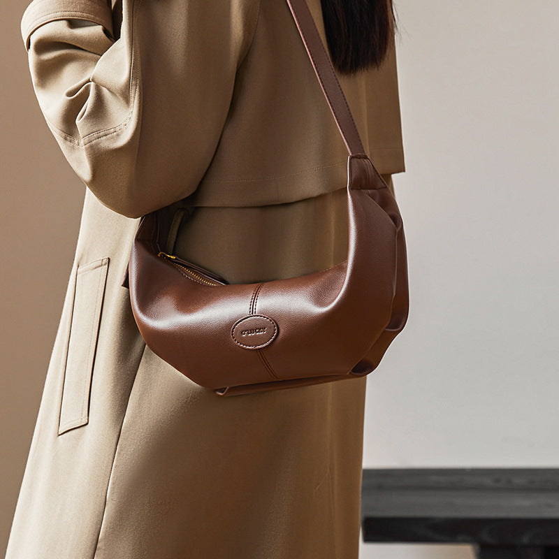 Inner compartments of the bag with phone and zipper pouch