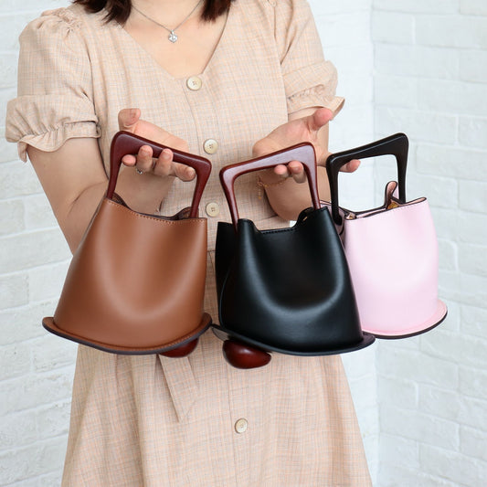Front view of imported cowhide leather bucket bag